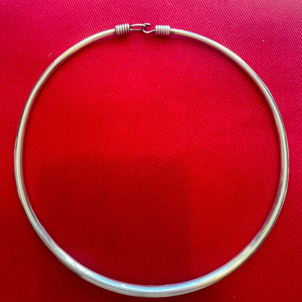 Sterling silver torque necklace.  Museum of Art NYC design.